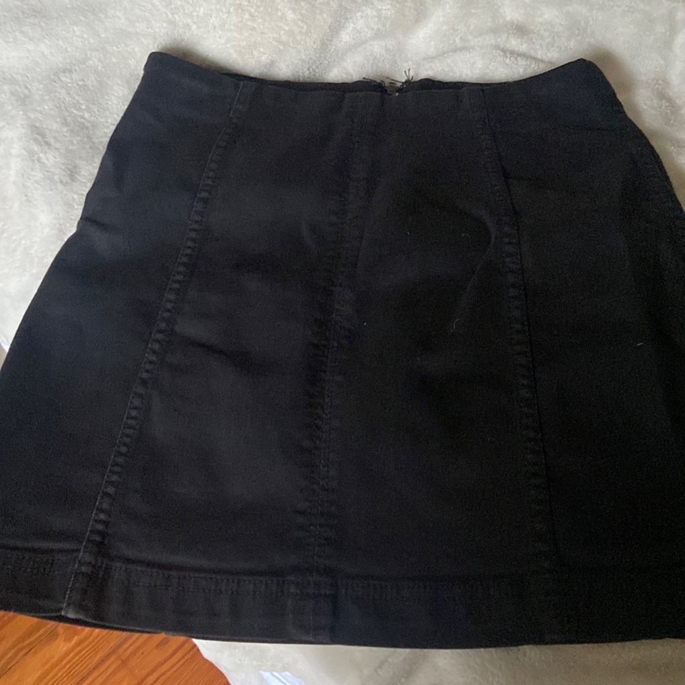 Free people black denim mini skirt. Size 6 fits like a 4. Only worn once.